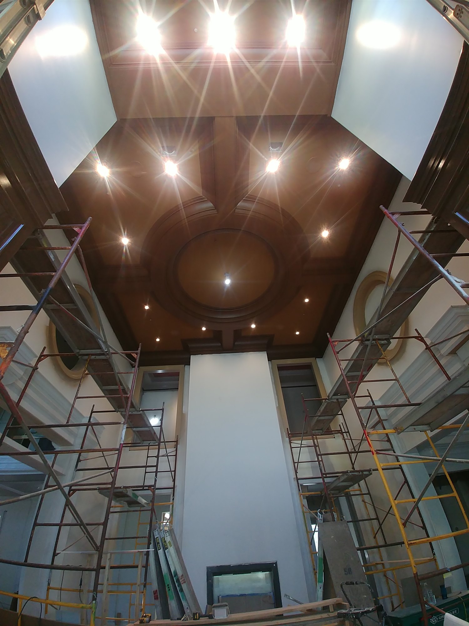 Coffered dome ceiling under installation with scaffolding still in place